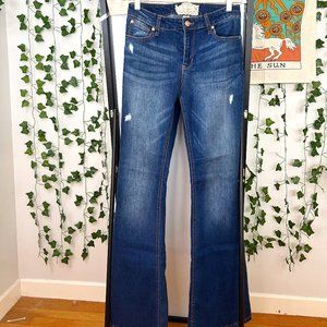 Distressed flare jean.